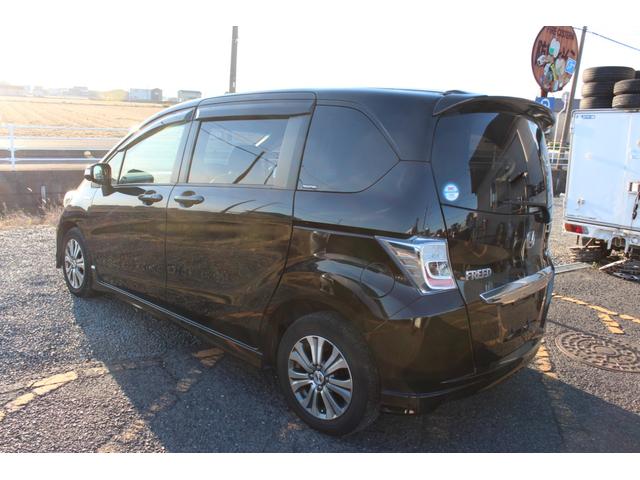 フリードハイブリッド ジャストセレクション　フルセグナビ　バックカメラ　左右パワースライドドア　スマートキー二個　オートライトＨＩＤ　ＥＴＣ　純正アルミ（10枚目）