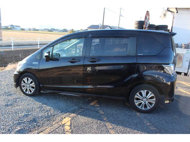 フリードハイブリッド ジャストセレクション　フルセグナビ　バックカメラ　左右パワースライドドア　スマートキー二個　オートライトＨＩＤ　ＥＴＣ　純正アルミ（12枚目）