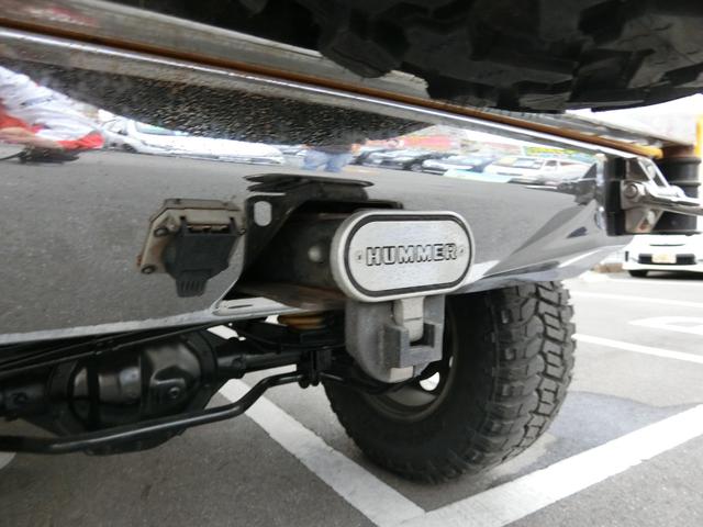 ベースグレード 左H 4WD 外20AW リフトアップ 外マフラー 背面タイヤ HID 大型4連フォグ 後席モニター サンルーフ 黒本革 PWシート シートH HDDナビ フルセグTV バックカメラ メッキパーツ(24枚目)