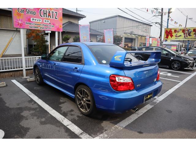 インプレッサ ＷＲＸ　２００３　Ｖリミテッド　５ＭＴ　ターボ　４ＷＤ　ＳＴＩエアロ　レイズ１７ＡＷ　ローダウン　ＨＩＤ　リアスポ　タワーバー　セミバケシート　モモステ　メモリーナビ　フルセグ　ＤＶＤ再生　キーレス　ＥＴＣ　オートＡＣ　Ｔタイベル済（6枚目）