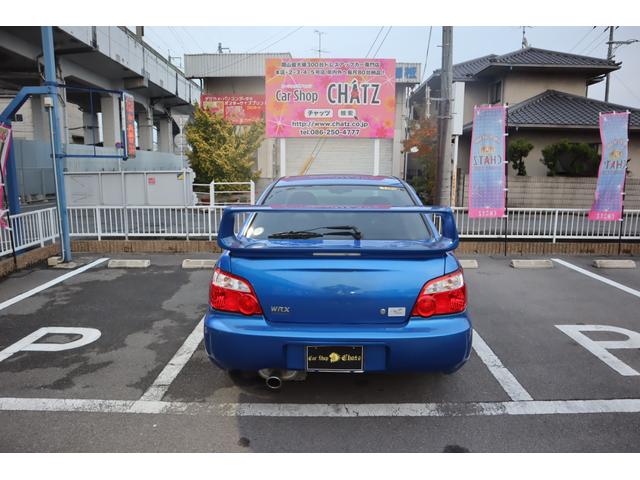 インプレッサ ＷＲＸ　２００３　Ｖリミテッド　５ＭＴ　ターボ　４ＷＤ　ＳＴＩエアロ　レイズ１７ＡＷ　ローダウン　ＨＩＤ　リアスポ　タワーバー　セミバケシート　モモステ　メモリーナビ　フルセグ　ＤＶＤ再生　キーレス　ＥＴＣ　オートＡＣ　Ｔタイベル済（8枚目）