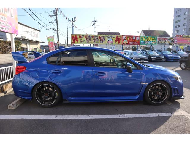 ＷＲＸ ＳＴＩ ＳＴＩ　１オーナー　６ＭＴ　ターボ　ＡＷＤ　外品エアロ　レイズ１８ＡＷ　ＨＫＳ車高調　ＨＫＳマフラー　Ｒウイング　ＬＥＤ＆フォグ　メタルクラッチ　モモＨ　半本革　ナビフルセグ　Ｓカメラ　ＢＳＭ　横滑り防止　Ｕ（4枚目）