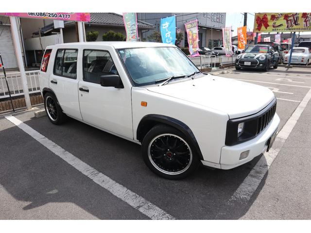 ラシーン 　４ＷＤ　外品グリル　ＯＺＲＡＣＩＮＧ１６ＡＷ　ローダウン　外品マフラー　外品ＬＥＤヘッドライト　外品キーレス　革調シートカバー　メモリーナビ　ＥＴＣ　タイミングチェーン式　車検令和８年１２月（3枚目）