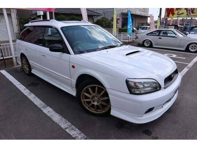 レガシィツーリングワゴン ＧＴ－Ｂ　Ｅ－ｔｕｎｅＩＩ　５ＭＴツインターボ　４ＷＤ　Ｗサンルーフ　外品フルエアロ　アイライン　ルーフレール　ＯＺＲＡＣＩＮＧ１７ＡＷ　スタッドレス　外品ショック　外マフラー　パワーシート　ナビＤＶＤ　令和４年タイベル交換済（3枚目）