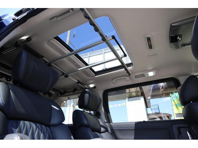 エルグランド オーテック 1オーナー エアロパーツ サンルーフ 黒革パワーシート オットマン 3列シート シートH ディスプレイオーディオ Bluetooth 全周囲カメラ 後席モニター Wエアコン 両側PSD 電動リアゲート(19枚目)