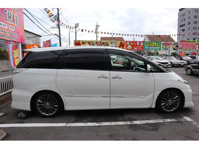 エスティマ アエラス プレミアムエディション シルクブレイズF・Rスポイラー モデリスタSスカート 外品グリル レイズヴォウジェ18AW 半革 Pシート オットマン アルパインBIG9ナビフルセグ 後席モニター 両側パワスラ ディーラー記録簿8枚(4枚目)