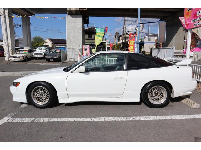 180SX タイプX シルエイティ仕様(Fバンパーフェンダー・ボンネット・ヘッドライト) 5MT ターボ S・Rエアロ Rウイング SSRアルミ 車高調 HKSマフラー MOMOステ BRIDEセミバケ Bluetooth(5枚目)