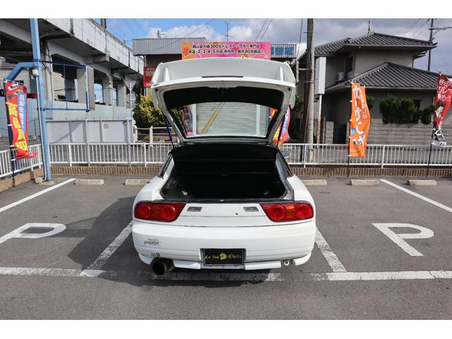 180SX タイプX シルエイティ仕様(Fバンパーフェンダー・ボンネット・ヘッドライト) 5MT ターボ S・Rエアロ Rウイング SSRアルミ 車高調 HKSマフラー MOMOステ BRIDEセミバケ Bluetooth(9枚目)