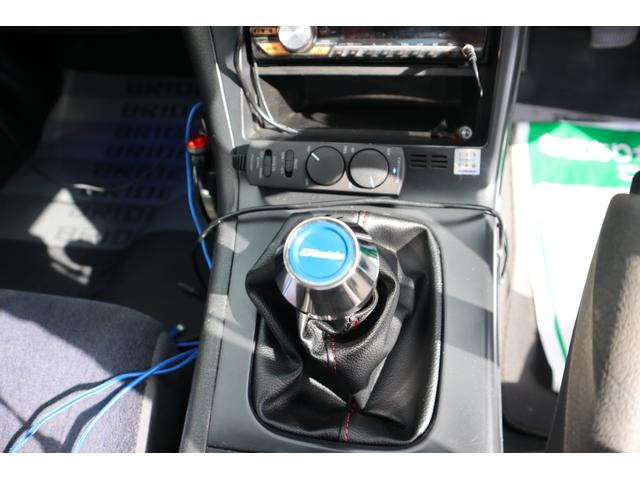 180SX タイプX シルエイティ仕様(Fバンパーフェンダー・ボンネット・ヘッドライト) 5MT ターボ S・Rエアロ Rウイング SSRアルミ 車高調 HKSマフラー MOMOステ BRIDEセミバケ Bluetooth(16枚目)