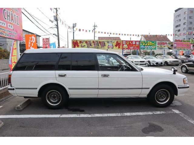 クラウンステーションワゴン スーパーデラックス　１Ｇエンジン　ベンチシート　コラム４ＭＴ　８人乗り　３列シート　ポータブルナビ　外品オーディオ　外品１４インチＡＷ　外品ショック　ＥＴＣ　キーレス　タイミングベルト交換済み　エアコン　ＰＳ　ＰＷ（4枚目）