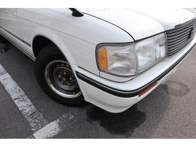 クラウンステーションワゴン スーパーデラックス　１Ｇエンジン　ベンチシート　コラム４ＭＴ　８人乗り　３列シート　ポータブルナビ　外品オーディオ　外品１４インチＡＷ　外品ショック　ＥＴＣ　キーレス　タイミングベルト交換済み　エアコン　ＰＳ　ＰＷ（29枚目）