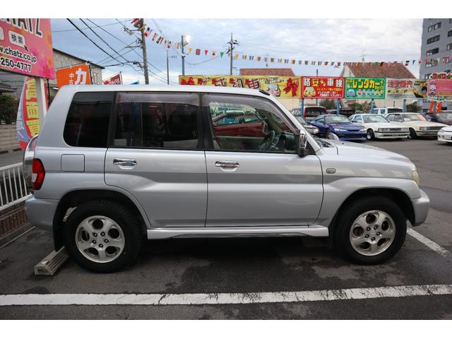 パジェロイオ アクティブフィールドエディション１．８　フルタイム４ＷＤ　メモリーナビ　フルセグＴＶ　ＣＤ・ＤＶＤ　Ｂｌｕｅｔｏｏｔｈ　バックカメラ　ＥＴＣ　ＡＵＴＯエアコン　純正１６インチＡＷ　キーレス　フォグ　ＴＶキャンセラー（4枚目）