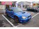 ＷＲＸ　２００３　Ｖリミテッド　５ＭＴ　ターボ　４ＷＤ　ＳＴＩエアロ　レイズ１７ＡＷ　ローダウン　ＨＩＤ　リアスポ　タワーバー　セミバケシート　モモステ　メモリーナビ　フルセグ　ＤＶＤ再生　キーレス　ＥＴＣ　オートＡＣ　Ｔタイベル済(3枚目)