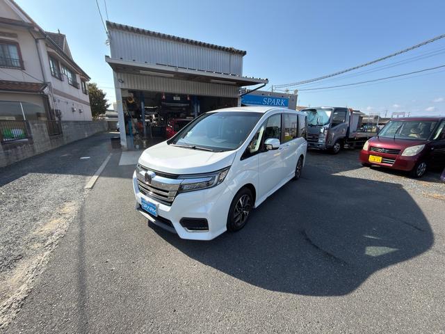 ステップワゴンスパーダ スパーダ ホンダセンシング ワンオーナー禁煙車 サイドリフトアップシート フロアマット新品 7人乗り 純正エンジンスターターリフトアップシートリモコン(2枚目)