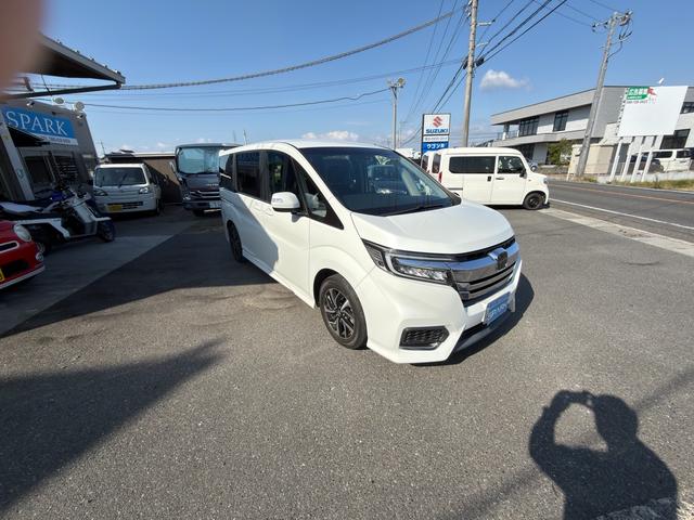 ステップワゴンスパーダ スパーダ ホンダセンシング ワンオーナー禁煙車 サイドリフトアップシート フロアマット新品 7人乗り 純正エンジンスターターリフトアップシートリモコン(4枚目)