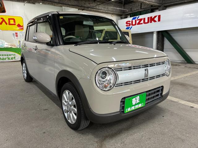 アルトラパン Ｘ　社外ナビ　バックカメラ　ＥＴＣ　衝突被害軽減ブレーキ　横滑り防止装置　アイドリングストップ　プッシュスタート　スマートキー　ＨＩＤヘッドライト　オートエアコン　シートヒーター　電動格納ドアミラー（10枚目）