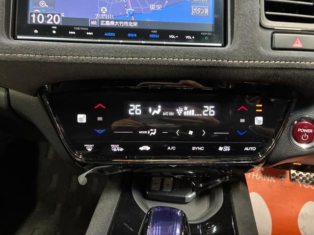 ヴェゼル ハイブリッドＲＳ・ホンダセンシング　純正ナビ　バックカメラ　ＥＴＣ　衝突被害軽減ブレーキ　レーンキープアシスト　横滑り防止装置　プッシュスタート　オートライト　オートエアコン　シートヒーター　電子パーキングブレーキ　電動格納ドアミラー（25枚目）