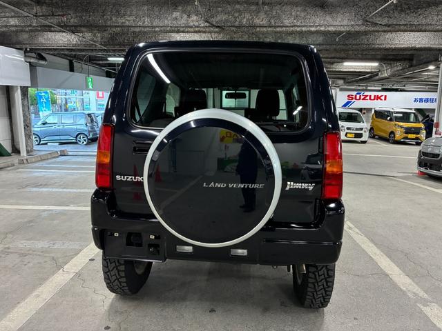 ジムニー ランドベンチャー　５ＭＴ車　ＥＴＣ　トーヨータイヤオープンカントリー　純正アルミホイール　電動格納ドアミラー（9枚目）