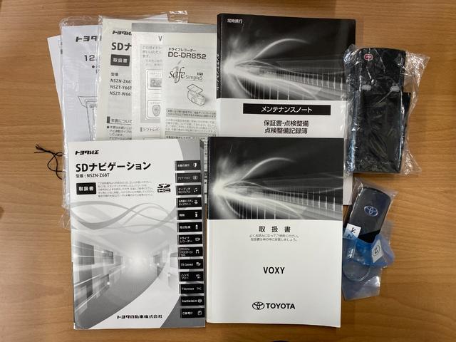 ヴォクシー ハイブリッドＺＳ　煌ＩＩＩ　ワンオーナー・ＴＲＤエアロ・両側パワースライドドア・ＬＥＤヘッドライト・クルコン・２０２ブラック・純正ＯＰ１０インチナビ・フルセグ・Ｂｌｕｅｔｏｏｔｈ・フリップダウンモニター・バックカメラ・ＥＴＣ（64枚目）