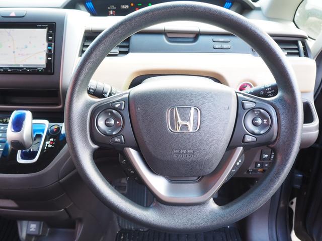 フリードハイブリッド ハイブリッド・Ｇホンダセンシング　両側電動スライドドア　　メモリーナビ　フルセグＴＶ　バックカメラ　ＥＴＣ　Ｂｌｕｅｔｏｏｔｈ　ＬＥＤヘッドライト　スマートキー　レーダークルーズコントロール（29枚目）