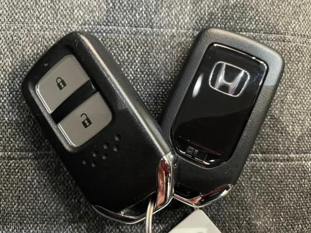 フィット ホーム ナビ バックカメラ ドライブレコーダー ETC アダプティブクルーズコントロール ステリモ パーキングセンサ― 衝突被害軽減ブレーキ スマートキー オートライト(61枚目)