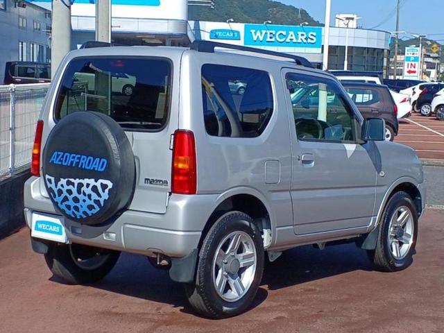 ＡＺオフロード ４ＷＤ　ＸＣ　保証書／社外　ナビ／ＡＢＳ／ワンセグＴＶ／ルーフレール／衝突安全ボディ／アルミホイール　純正　１６インチ／パワーウインドウ／キーレスエントリー／パワーステアリング／マニュアルエアコン／ユーザー買取車（3枚目）