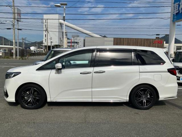 オデッセイハイブリッド eHEVアブソルート・EX 保証書/純正 11インチ SDナビ/フリップダウンモニター 純正 15.6インチ/ホンダセンシング/両側電動スライドドア/シートヒーター/マルチビューカメラシステム/車線逸脱防止支援システム 革シート(2枚目)