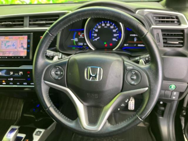 フィットハイブリッド ハイブリッド・Ｓパッケージ　保証書／純正　ＳＤナビ／ヘッドランプ　ＬＥＤ／Ｂｌｕｅｔｏｏｔｈ接続／ＥＴＣ／ＥＢＤ付ＡＢＳ／横滑り防止装置／アイドリングストップ／バックモニター／フルセグＴＶ／ＤＶＤ／エアバッグ　運転席　ＤＶＤ再生（15枚目）