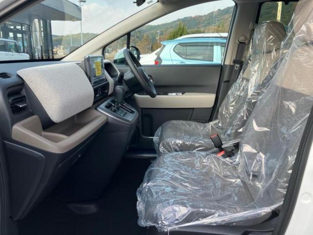 フリード AIR 保証書/純正 8インチ ナビ/ホンダセンシング/両側電動スライドドア/車線逸脱防止支援システム/登録済未使用車/ヘッドランプ LED/Bluetooth接続/EBD付ABS/ワンセグTV/禁煙車(7枚目)