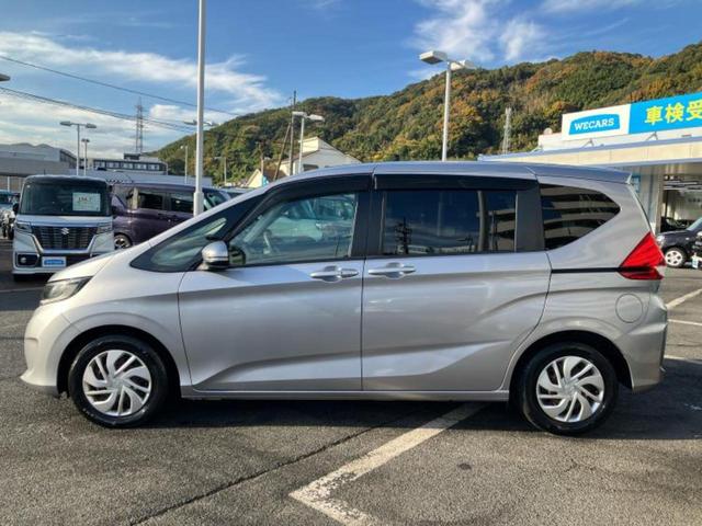 フリード Ｇホンダセンシング　新品タイヤ／保証書／純正　ＳＤナビ／ホンダセンシング／両側電動スライドドア／車線逸脱防止支援システム／Ｂｌｕｅｔｏｏｔｈ接続／ＥＴＣ／ＥＢＤ付ＡＢＳ／横滑り防止装置／アイドリングストップ　バックカメラ（2枚目）