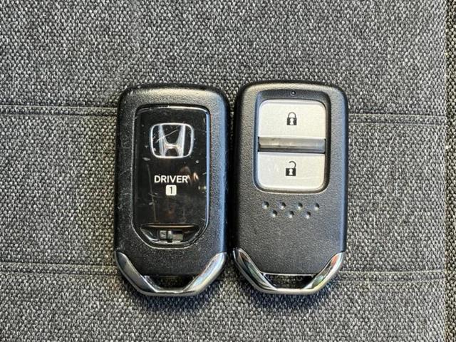フィット eHEVホーム 新品タイヤ/保証書/純正 9インチ メモリーナビ/ホンダセンシング/車線逸脱防止支援システム/ドライブレコーダー 前後/ヘッドランプ LED/USBジャック/Bluetooth接続/ETC DVD再生(31枚目)