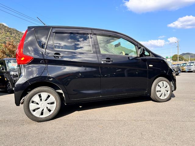 eKワゴン E 1年保証 走行52787Km CDチューナー 電動格納式ドアミラー 社外アルミホイール ベンチシート 衝突安全ボディ ABS キーレスエントリー(8枚目)