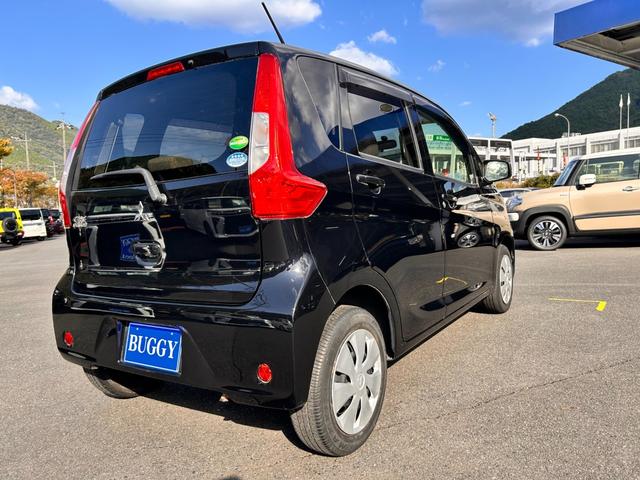 eKワゴン E 1年保証 走行52787Km CDチューナー 電動格納式ドアミラー 社外アルミホイール ベンチシート 衝突安全ボディ ABS キーレスエントリー(9枚目)