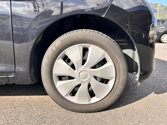 eKワゴン E 1年保証 走行52787Km CDチューナー 電動格納式ドアミラー 社外アルミホイール ベンチシート 衝突安全ボディ ABS キーレスエントリー(26枚目)