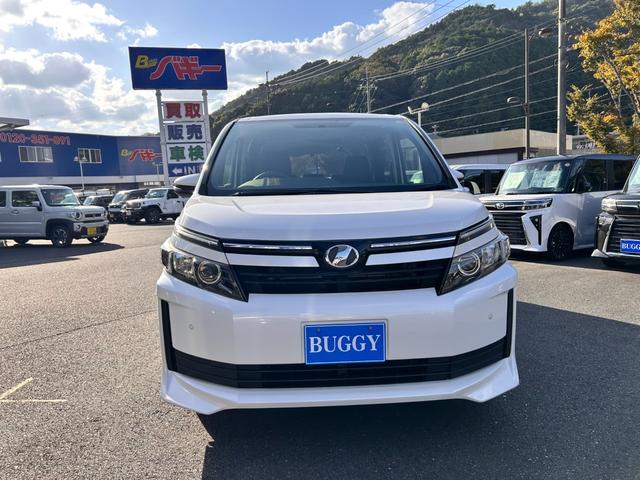 ヴォクシー X 6か月保証 8人乗り 走行65316Km 両側電動スライドドア LEDヘッドライト ETC 電動格納式ドアミラー アイドリングストップ ダブルエアコン プッシュ式スタート衝突安全ボディ(2枚目)