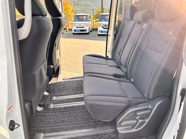 ヴォクシー X 6か月保証 8人乗り 走行65316Km 両側電動スライドドア LEDヘッドライト ETC 電動格納式ドアミラー アイドリングストップ ダブルエアコン プッシュ式スタート衝突安全ボディ(18枚目)