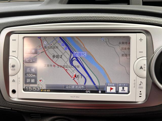 ヴィッツ F スマイルエディション 6か月保証 走行35232Km 純正ナビ ミュージックサーバ バックカメラ プッシュ式スタート 純正フロアマット 純正ドアバイザー 荷物落下防止ガード コーナーポール ABS 点検記録簿(9枚目)