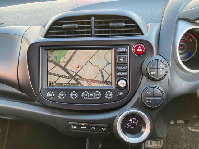フィット ＲＳ　ハイウェイエディション　ＥＴＣ　バックカメラ　ナビ　ＴＶ　ＨＩＤ　電動格納ミラー　盗難防止システム　衝突安全ボディ　ＡＢＳ　ＣＤ　エアコン　パワーステアリング　パワーウィンドウ（26枚目）