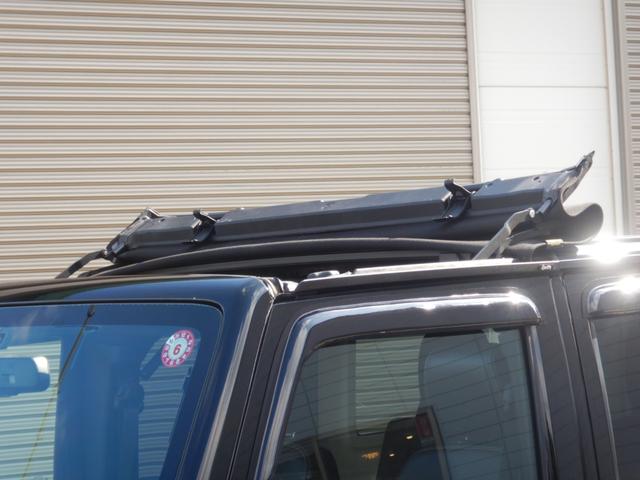 ジープ・ラングラーアンリミテッド サハラ BEstopサンライダー 社外LEDヘッドライト・テール 社外フロントバンパー リフトキット 20インチアルミ 社外マフラー(純正有) 黒レザーシート BTオーディオ バックカメラ 社外フェンダー(11枚目)