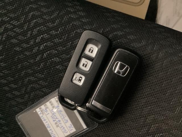 Ｎ－ＢＯＸカスタム Ｇ・Ａパッケージ　アルミホイール　メモリーナビ　リアカメラ　ワンセグＴＶ　横滑り防止装置付き　エアコン　ＤＶＤ再生　デュアルエアバッグ　スマートキー　ナビＴＶ　ＥＴＣ　リモコンキー　両側スライド左側パワースライドドア（18枚目）