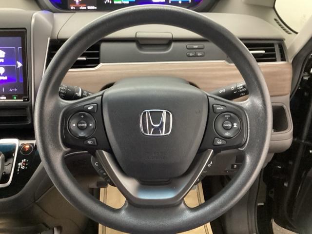 フリードハイブリッド ハイブリッド・Ｇホンダセンシング　メモリーナビ　ドラレコ　ＥＴＣ　軽減ブレーキ　キーフリーシステム　ＤＶＤ再生可能　ＥＣＯＮ　後カメラ　Ａクルーズ　地デジフルセグＴＶ　ＬＥＤヘッドランプ　ドライブレコーダ　パワーウインドウ　エアバッグ（3枚目）