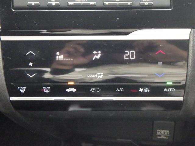 フィット 13G・Fパッケージ DVD再生可能 スマ-トキ- 記録簿有り VSA ETC付き 助手席エアバッグ Rカメラ オートエアコン エアバック PS キ-フリ- 1セグ PW ABS アイドリングSTOP(11枚目)