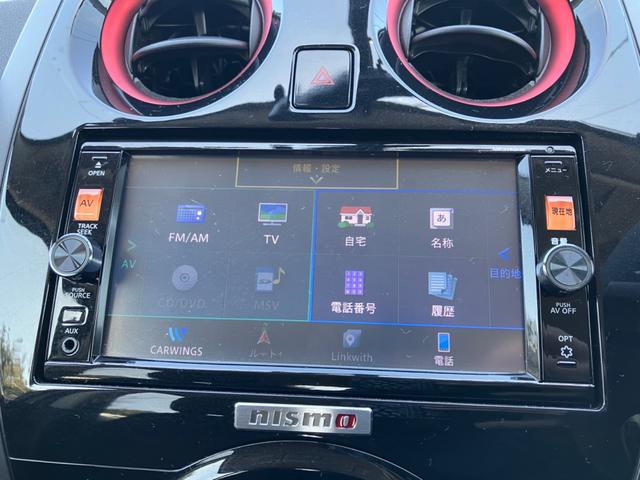 ノート ニスモ　ＥＴＣ　バックカメラ　ナビ　ＴＶ　衝突被害軽減システム　アルミホイール　オートライト　スマートキー　アイドリングストップ　電動格納ミラー　ＣＶＴ　盗難防止システム　衝突安全ボディ　ＡＢＳ　ＥＳＣ　ＣＤ（5枚目）