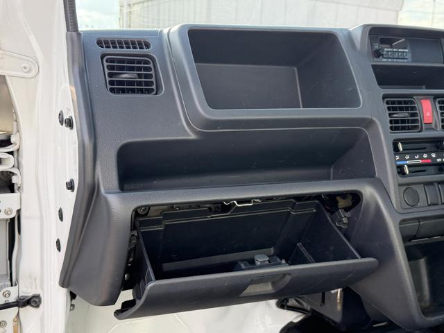 キャリイトラック 頑丈ダンプ　４ＷＤ・５ＭＴ・電動ダンプ・三方開・純正ＡＭ／ＦＭラジオ・エアコン・パワステ・トランスファーレバー・ライトレベライザー・運転席エアバッグ（15枚目）