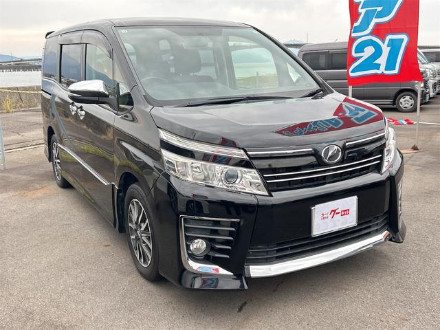 ヴォクシー ZS 煌 ETC バックカメラ ナビ TV 両側電動スライドドア オートライト LEDヘッドランプ スマートキー アイドリングストップ 電動格納ミラー 後席モニター 3列シート CVT アルミホイール CD(13枚目)