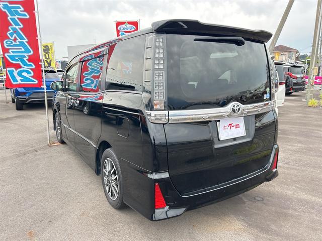 ヴォクシー ZS 煌 ETC バックカメラ ナビ TV 両側電動スライドドア オートライト LEDヘッドランプ スマートキー アイドリングストップ 電動格納ミラー 後席モニター 3列シート CVT アルミホイール CD(16枚目)