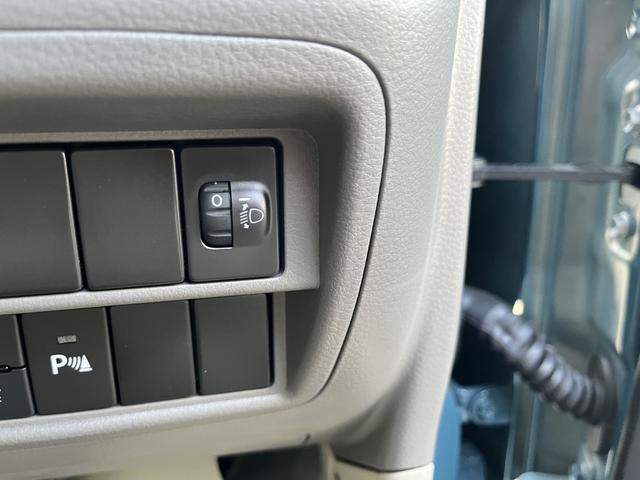 ヘッドライトレベライザーです。