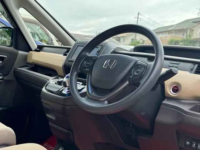 フリードハイブリッド ハイブリッド・Ｇホンダセンシング　ナビ　フルセグＴＶ　Ｂｌｕｅｔｏｏｔｈ　バックカメラ　前後ドライブレコーダー　ＥＴＣ　両側パワースライドドア　レーダークルーズコントロール　衝突被害軽減システム　レーンアシスト　プッシュスタート（8枚目）