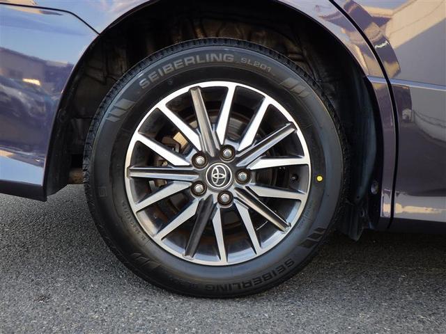 ノア Ｓｉ　１オーナー　地デジ　ＤＶＤ視聴可　ダブルエアコン　ＬＥＤヘットライト　ＥＴＣ付き　横滑り防止機能　ナビＴＶ　三列シート　ＡＷ　ＡＡＣ　パワーウインドウ　メモリーナビ　ＡＢＳ　ウォークスルー　キーフリー（10枚目）