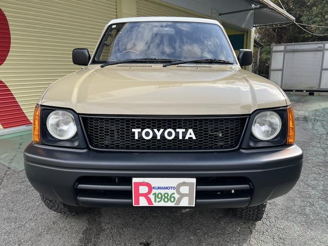 ランドクルーザープラド TX 3.0ディーゼルTB・8人乗・ナロボディー・フルタイム4WD・全塗装車・社外ナビ・フルセグ・Bカメラ・ETC・キーレス・リヤヒーター・ウッドコンビH・丸目フェイス・グリル・社外16AW・ホワイトレター(12枚目)
